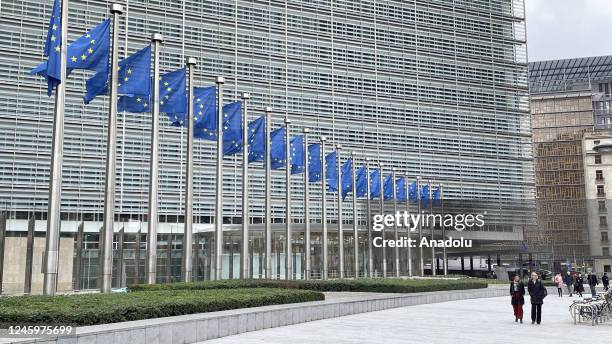 The Headquarters of the European Commission and European Union flags are seen in Brussels, Belgium on January 3, 2023.