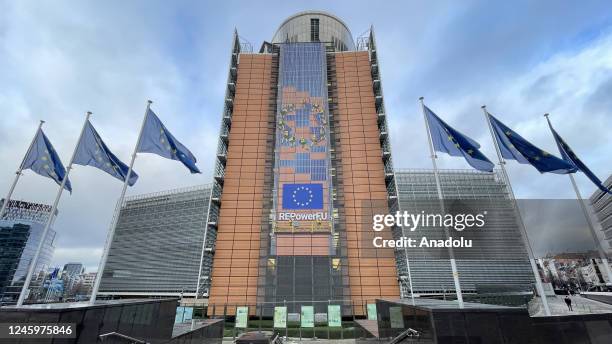 The Headquarters of the European Commission and European Union flags are seen in Brussels, Belgium on January 3, 2023.
