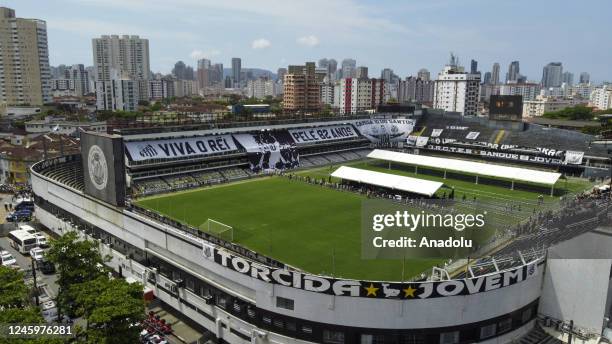 An aerial view of the Vila Belmiro Stadium during Brazilian football legend Pele's funeral procession as people gather, on January 03, 2023 in...