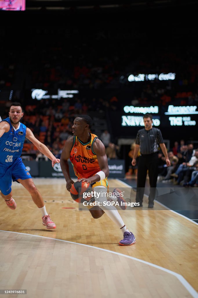 Jovan Novak of Carplus Fuenla (L) and Jared Harper of...
