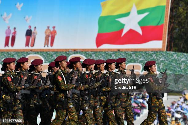 Members of the Myanmar military march at a parade ground to mark the country's Independence Day in Naypyidaw on January 4, 2023. - Myanmar's junta...