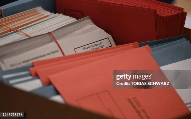 Documents for postal voting are pictured as preparations are under way for repeated elections, on January 4, 2023 in Berlin. - Repeated Berlin State...