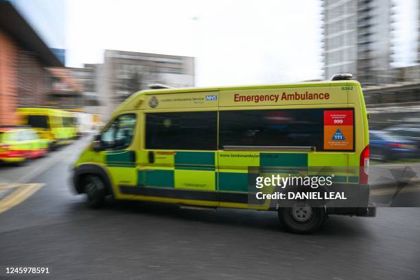 An ambulance arrives to the Royal London hospital in east London on January 4, 2023. - UK medical bodies said patients were dying due to inadequate...