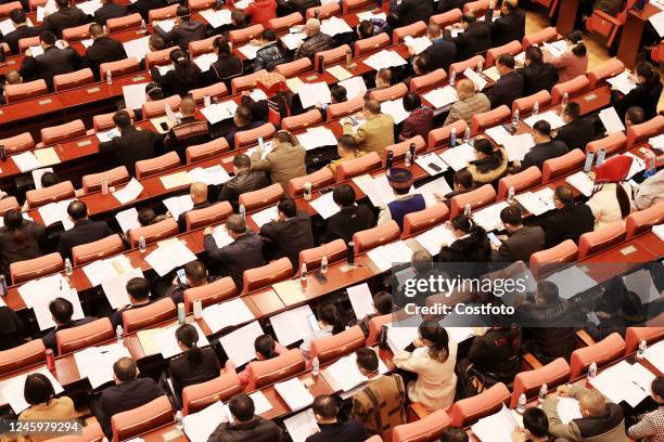 Photo taken on Jan 4, 2023 shows the scene of the fourth session of the 15th National People's Congress at the Wenchang Convention Center in Liuzhou...