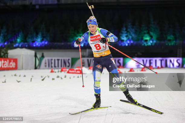 Juliya Dzhyma of Ukraine is skiing during the Bett1 Biathlon Team Challenge at Veltins Arena on December 28, 2022 in Gelsenkirchen, Germany.