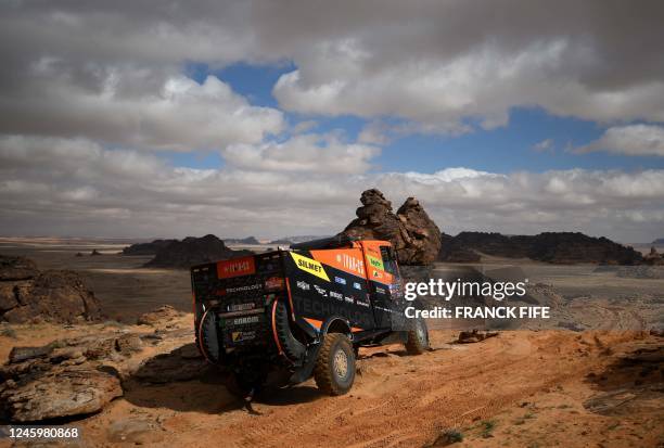 Czech truck driver Martin Macik, co-driver Frantisek Tomasek, and mechanic David Svanda compete during the fourth stage of the 2023 Dakar rally...