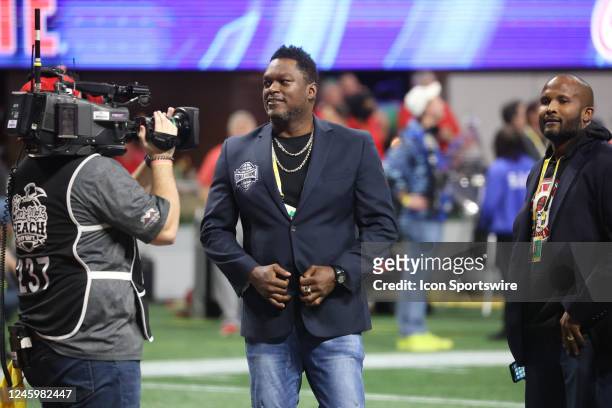 College Football Hall of Fame Inductee Lavar Arrington of Penn State is recognized during the college football Playoff Semifinal game at the...