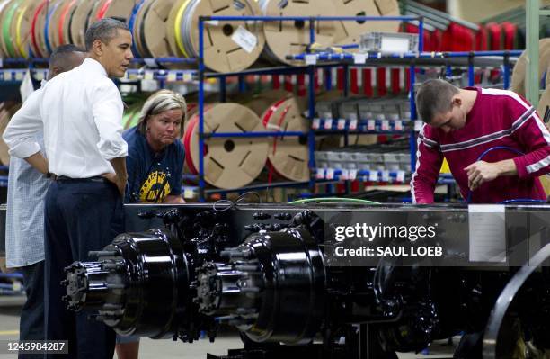 President Barack Obama tours the Daimler Trucks North America Manufacturing plant prior to speaking on the economy and jobs in Mount Holly, North...