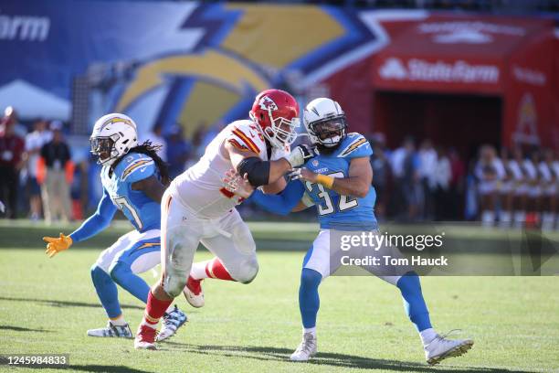 Kansas City Chiefs offensive guard Laurent Duvernay-Tardif and San Diego Chargers free safety Eric Weddle in action during an NFL football game...