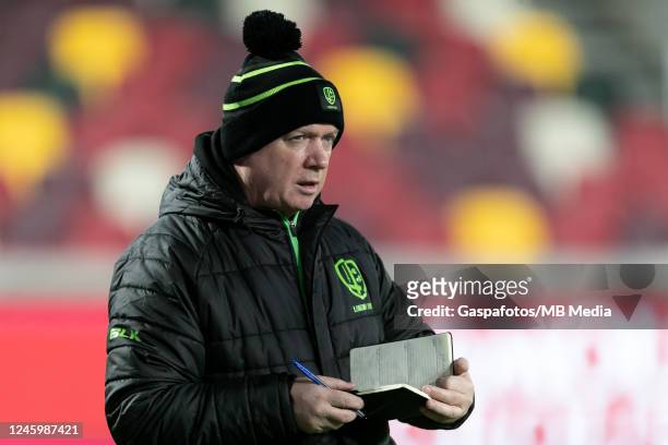 London Irish director of rugby Declan Kidney looks on during the warming up prior to the Premiership Rugby Cup match between London Irish and Bath...