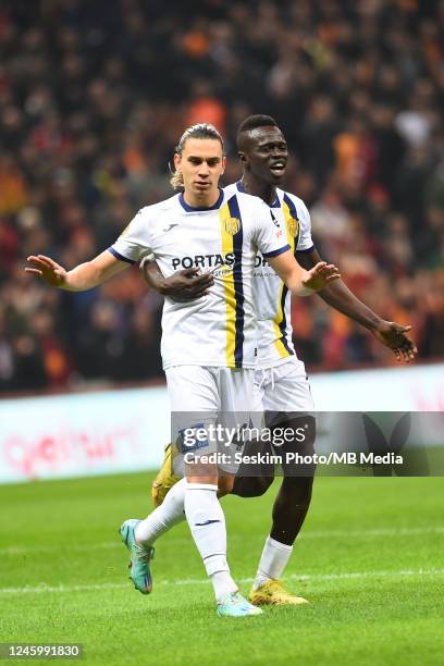 Taylan Antalyali of MKE Ankaragucu celebrates after scoring the first goal of his team with Lamine Diack during the Super Lig match between...