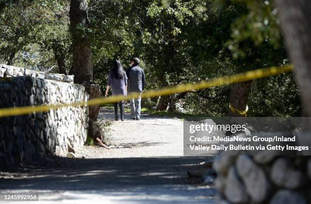 February 08: MT. BALDY, CA A couple walks along the closed Ice House Canyon Trail in Mt. Baldy, CA, Monday, February 8, 2016. The trails have been...