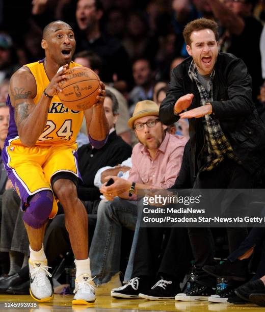 Los Angeles Lakers' Kobe Bryant looks at an official after loosing the ball out of bounds in the fourth quarter against the New Orleans Hornets...
