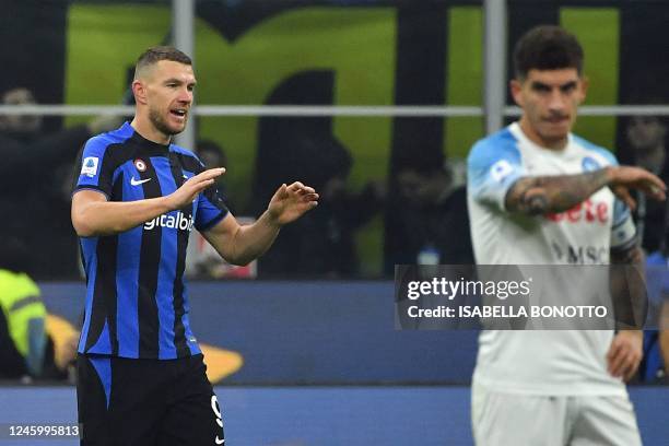 Inter Milan's Bosnian forward Edin Dzeko celebrates after scoring a goal during the Italian Serie A football match between Inter Milan and Napoli at...