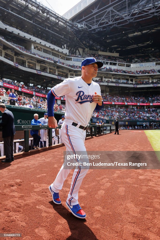 Corey Lee Rangers Corey Ragsdale of the Texas Rangers runs out of the dugout prior to ...