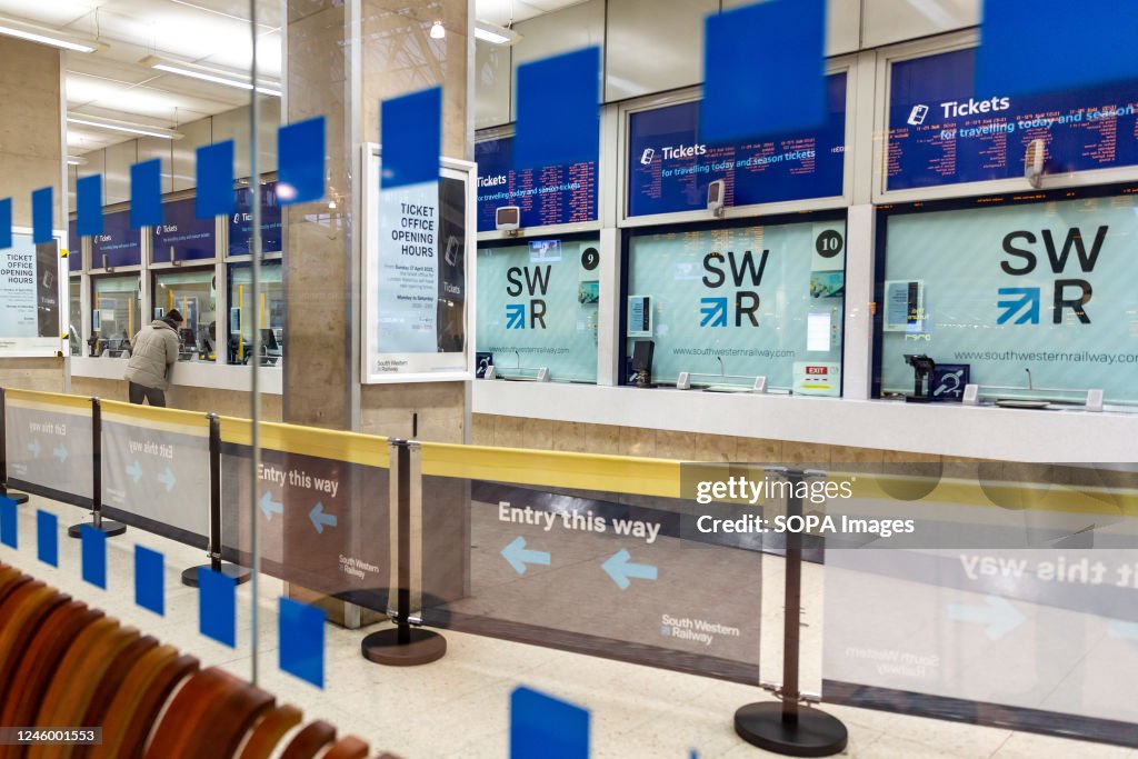 Closed ticket cash desks are seen at Waterloo train station...
