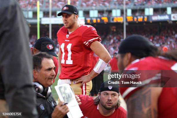 Alex Smith of the San Francisco 49ers on the sideline against the New Orleans Saints during the NFC divisional playoff game at Candlestick Park on...