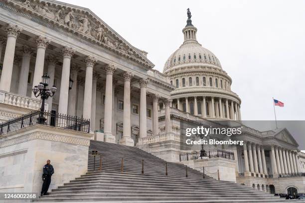 Capitol Police officer stands at the steps to the House of Representative outside the US Capitol in Washington, DC, US, on Wednesday, Jan. 4, 2023....