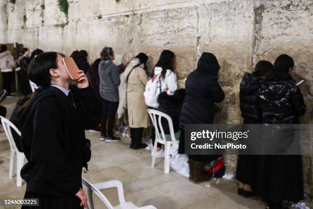 Jewish women are praying at the Women's Section by the Western Wall at the Temple Mount in Jerusalem, Israel on December 27, 2022.