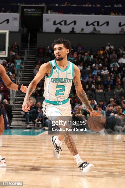 James Bouknight of the Charlotte Hornets dribbles the ball during the game against the Memphis Grizzlies on January 4, 2023 at Spectrum Center in...