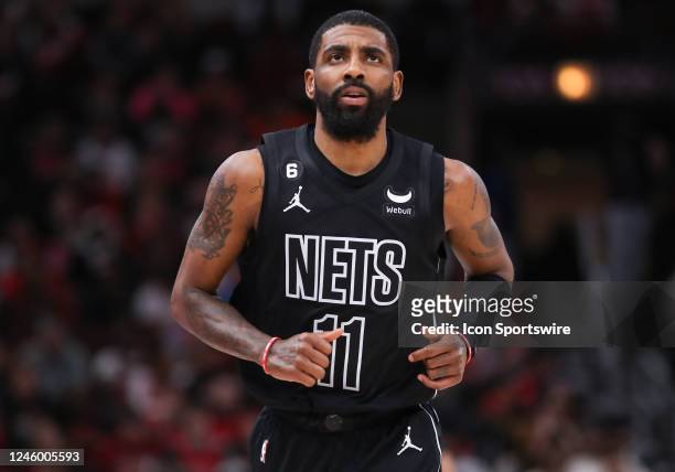 Brooklyn Nets Guard Kyrie Irving looks on during a NBA game between the Brooklyn Nets and the Chicago Bulls on January 4, 2023 at the United Center...