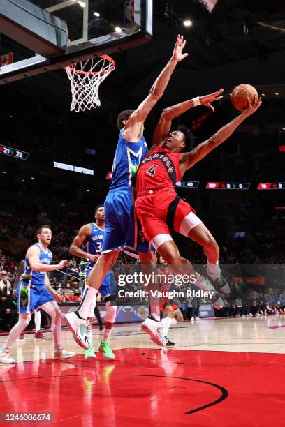 Scottie Barnes of the Toronto Raptors drives to the basket during the game against the Milwaukee Bucks on January 4, 2023 at the Scotiabank Arena in...