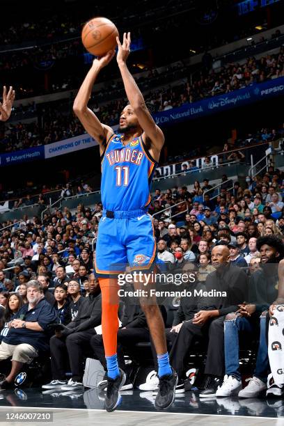 Isaiah Joe of the Oklahoma City Thunder shoots a three point basket against the Orlando Magic on January 4, 2023 at Amway Center in Orlando, Florida....