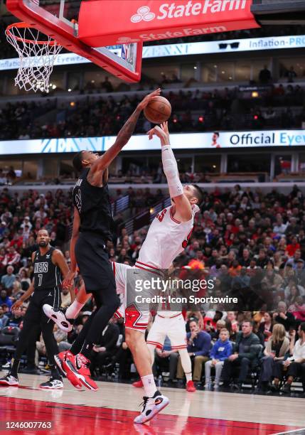 Brooklyn Nets Center Nic Claxton blocks Chicago Bulls Center Nikola Vucevic shot during a NBA game between the Brooklyn Nets and the Chicago Bulls on...
