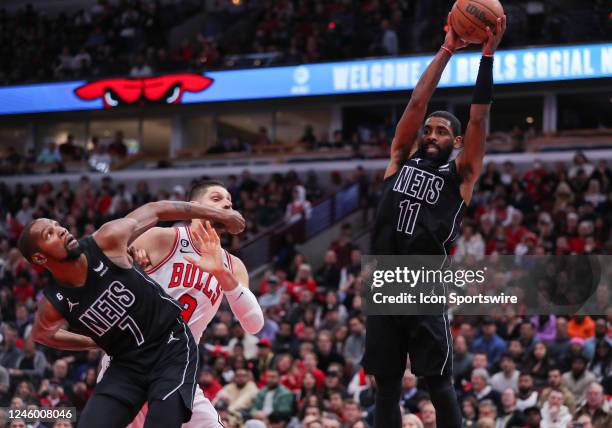 Brooklyn Nets Guard Kyrie Irving grabs the rebound during a NBA game between the Brooklyn Nets and the Chicago Bulls on January 4, 2023 at the United...