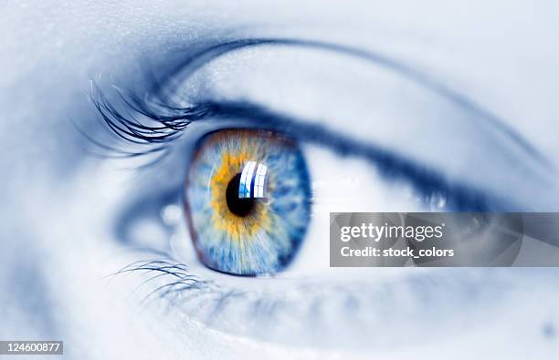 woman blue eye - retina stock pictures, royalty-free photos & images