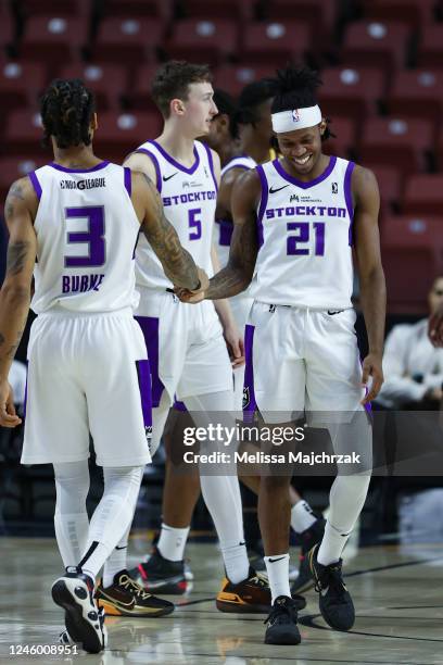 West Valley City, UT DJ Steward, Trey Burke and Alex OConnell of the Stockton Kings on the curt during the game against the Salt Lake City Stars at...