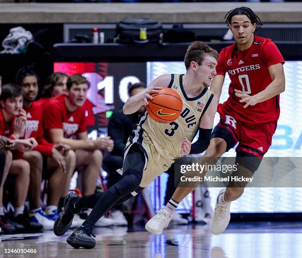 Braden Smith of the Purdue Boilermakers dribbles against Derek... News ...