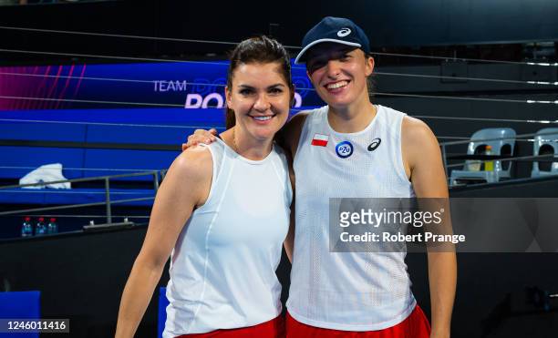 Team captain Agnieszka Radwanska of Poland and Iga Swiatek of Poland pose for a photo defeating Team Italy in the City Final on Day 7 of the United...