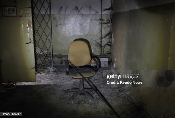 Photo taken on Dec. 8 shows the interior of an underground room in Kherson, southern Ukraine, used by the Russian military to torture Ukrainians...