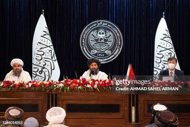 Acting minister of mines and petroleum Shahabuddin Dilawar , Afghanistan's acting first deputy prime minister Abdul Ghani Baradar and China's...