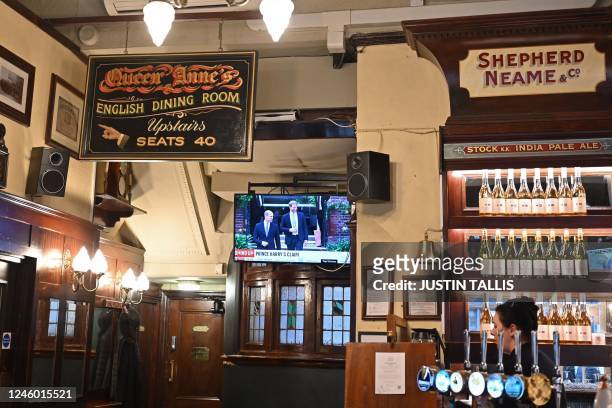 Television in the Westminster Arms in London on January 5 shows a Sky news report detailing leaked stories ahead of the publication of Britain's...
