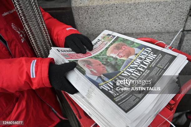 Copies of the Evening Standard newspaper, leading with stories about Britain's Prince Harry, Duke of Sussex's relationship with Britain's Prince...