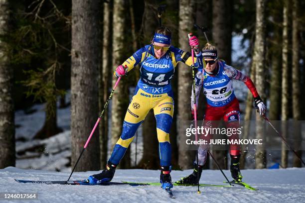 Swedens Elvira Oeberg and Austrias Anna Gandler compete in the Women 7,5 km sprint competition of the IBU Biathlon World Cup in Pokljuka, on January...