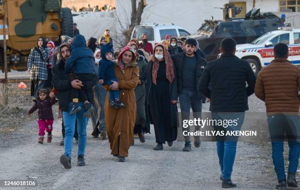 People try to access the funeral of singer and political refugee Mir Perwer, one of three Kurds killed in a December 2022 attack in Paris, despite...