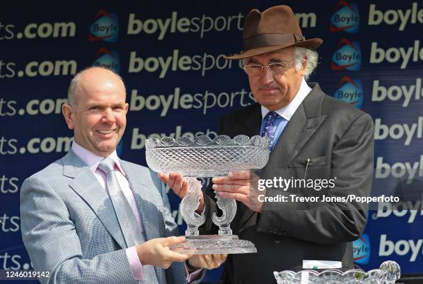 Racehorse owner breeder John Magnier of Coolmore receiving the trophy for Henrythenavigator winning the Irish 2000 Guineas at The Curragh, 24th May...