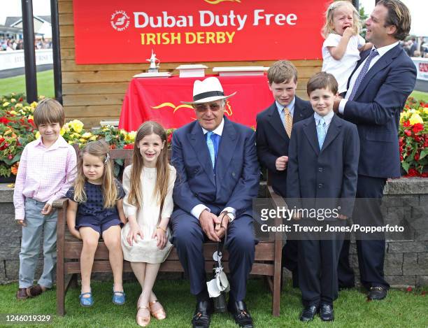 Racehorse owner breeder John Magnier of Coolmore with his grandchildren and son Tom at The Curragh, 28th June 2014.