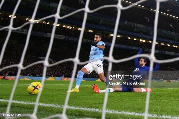 Riyad Mahrez of Manchester City scores the winning goal during the Premier League match between Chelsea FC and Manchester City at Stamford Bridge on...