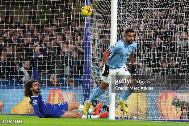 Riyad Mahrez of Manchester City scores the winning goal and celebrates during the Premier League match between Chelsea FC and Manchester City at...