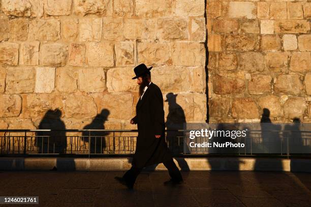 An orthodox Jew is seen walking in the Old City in Jerusalem, Israel on December 29, 2022.