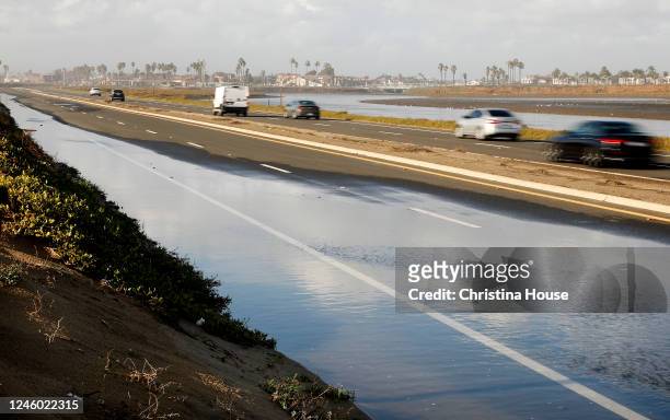 The northbound lanes have reopened while the southbound lanes remain closed due to flooding on Pacific Coast Highway between Warner Avenue and...