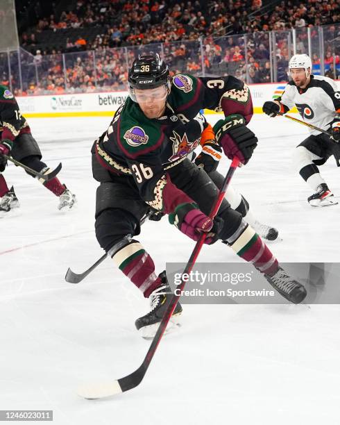 Arizona Coyotes Right Wing Christian Fischer skates with the puck during the first period of the National Hockey League game between the Arizona...