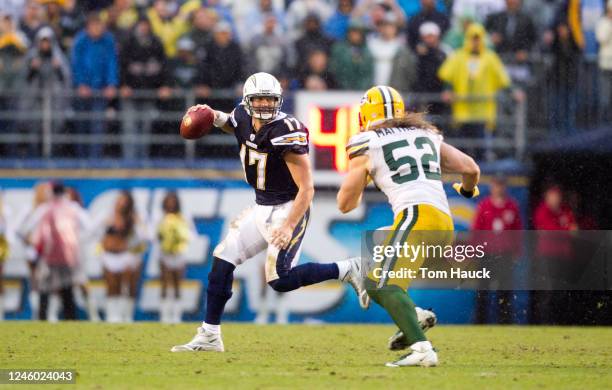 Phillip Rivers of the San Diego Chargers scrambles out to pass against the Green Bay Packers on November 6, 2011 at Qualcomm Stadium in San Diego,...