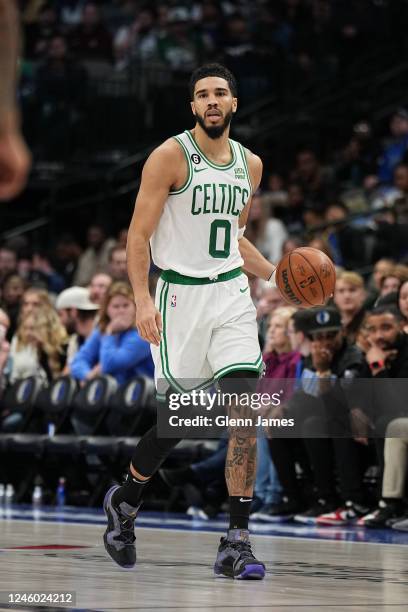 Jayson Tatum of the Boston Celtics dribbles the ball during the game against the Dallas Mavericks on January 5, 2022 at the American Airlines Center...