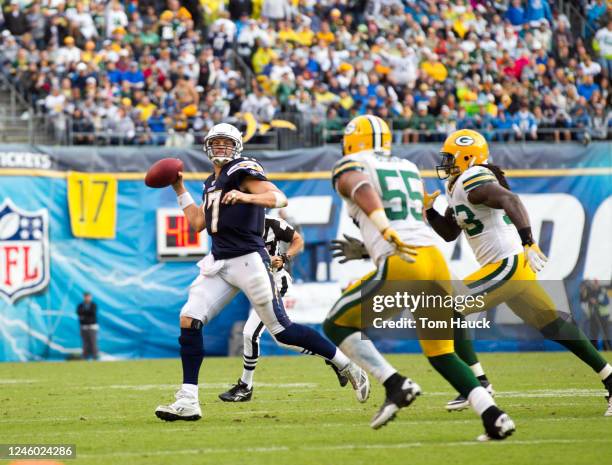 Phillip Rivers of the San Diego Chargers scrambles out to pass against the Green Bay Packers on November 6, 2011 at Qualcomm Stadium in San Diego,...