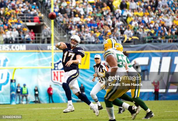 Phillip Rivers of the San Diego Chargers scrambles out to pass against the Green Bay Packers on November 6, 2011 at Qualcomm Stadium in San Diego,...